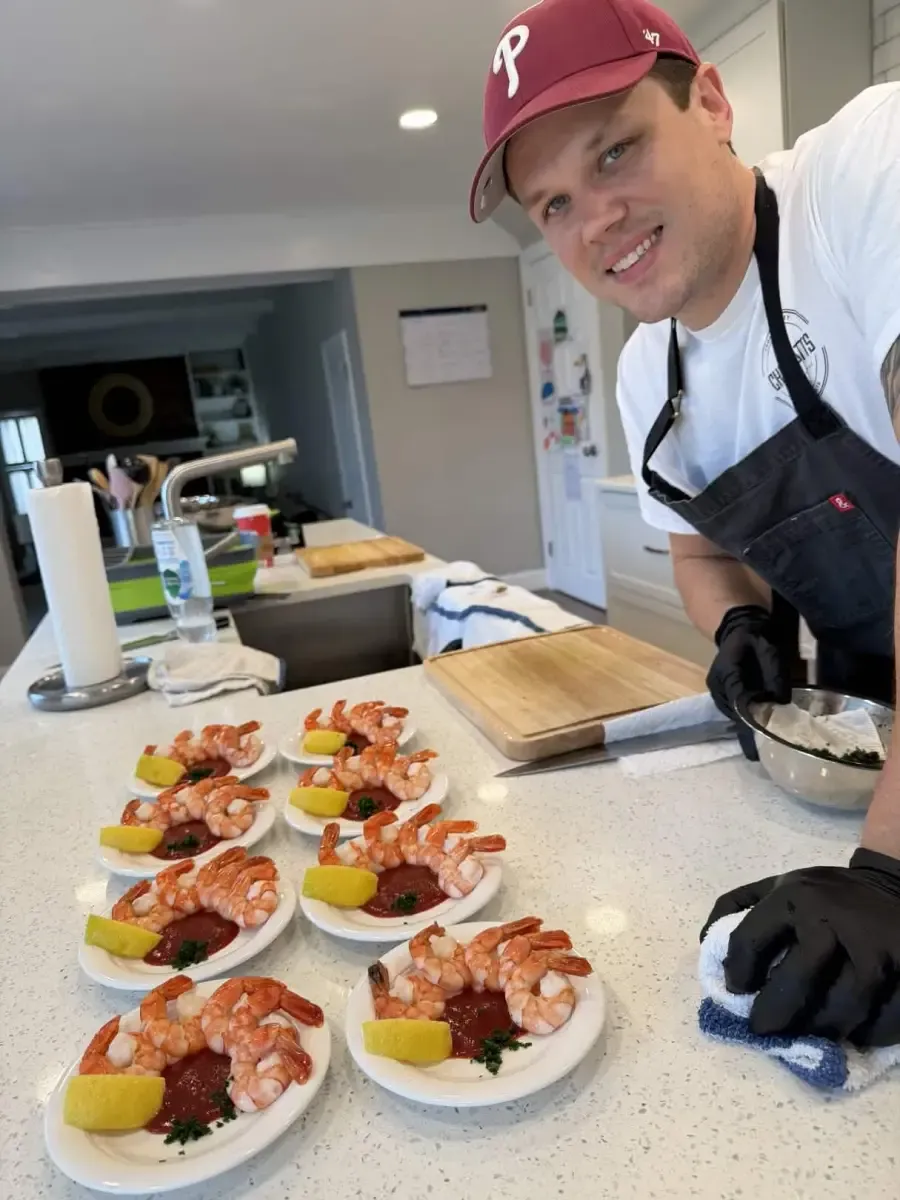 Chef Matt plating shrimp appetizers during private chef service