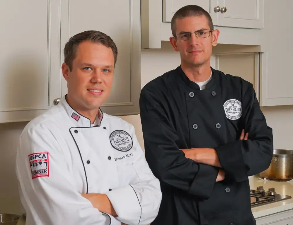 Chef Matt with team member in professional kitchen